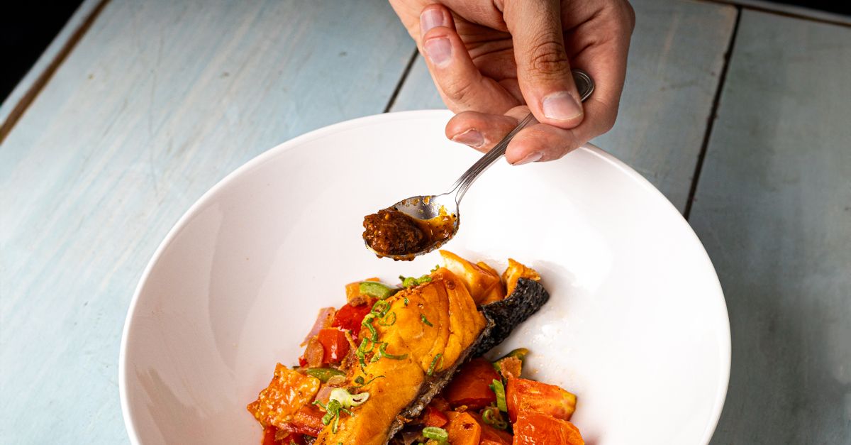 Prepared seafood dish with vegetables and spices